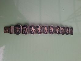 Armband mit asiatischen Gravuren silber gebraucht