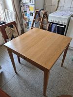 Table en bois carrée extensible
