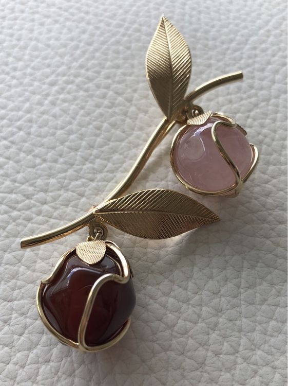 BROCHE ONYX ET DIAMANTS, VERS 1930 | ONYX AND DIAMOND BROOCH, 1930S