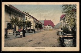 AK Bätterkinden, Straßenpartie mit Fachwerkhaus und Passante