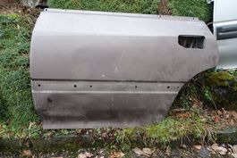 Subaru Legacy I 89-94 Türblatt mit Beule ohne Rost