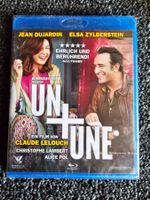 UN + UNE