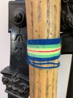 Regenstab aus Holz mit Wollverzierung 75 cm Länge
