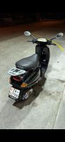 Vespa et4 125