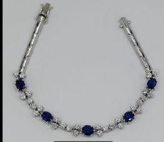 DAMENARMBAND WG 18CT., MIT BRILLANTEN, Saphire, QUITTUNG,