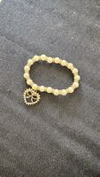 Perlenarmband mit Herz Anhänger 