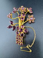 Vintage Brosche  mit violetten Steinen