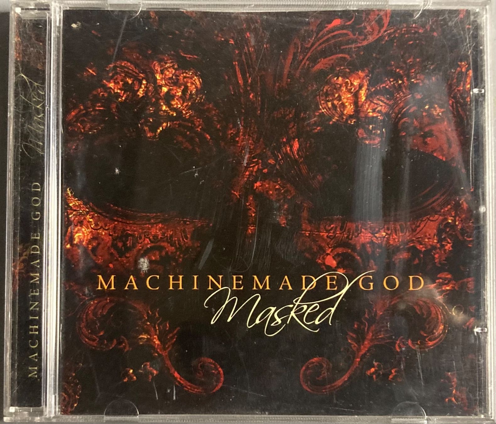 CD: MACHINEMADE GOD - MASKED – Usato da Poliez-Pittet venduto da Newtown-Records