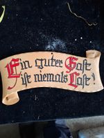 Holzschild "Ein guter Gast ist niemals Last"