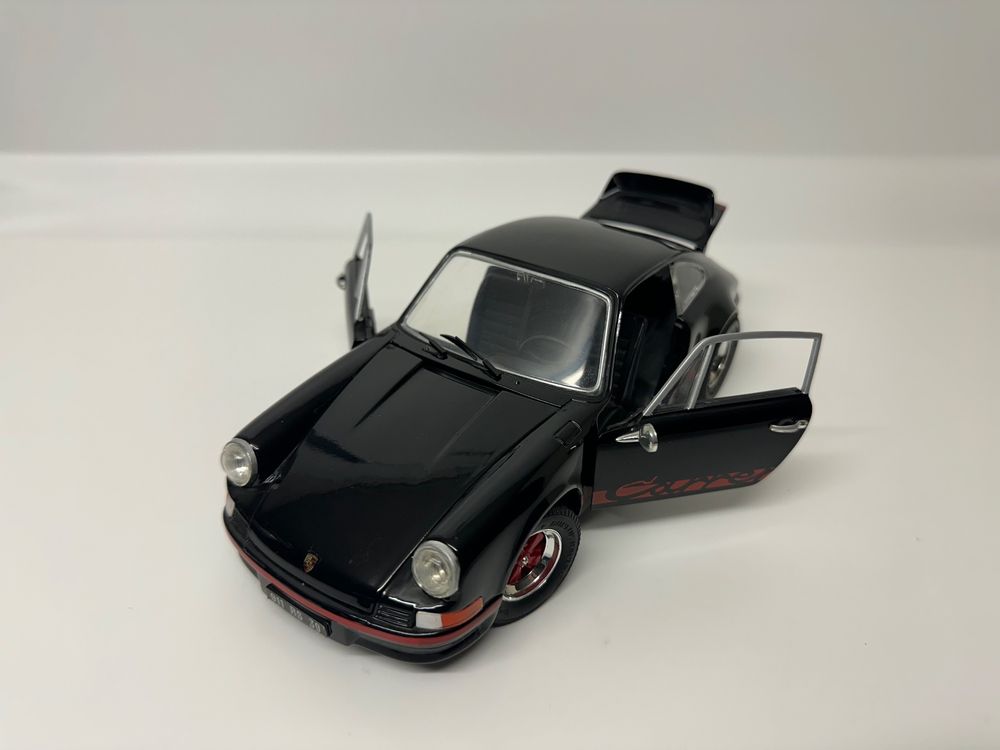 Porsche 911 Carrera RS 2.7 jouet à friction Welly jaune / noir