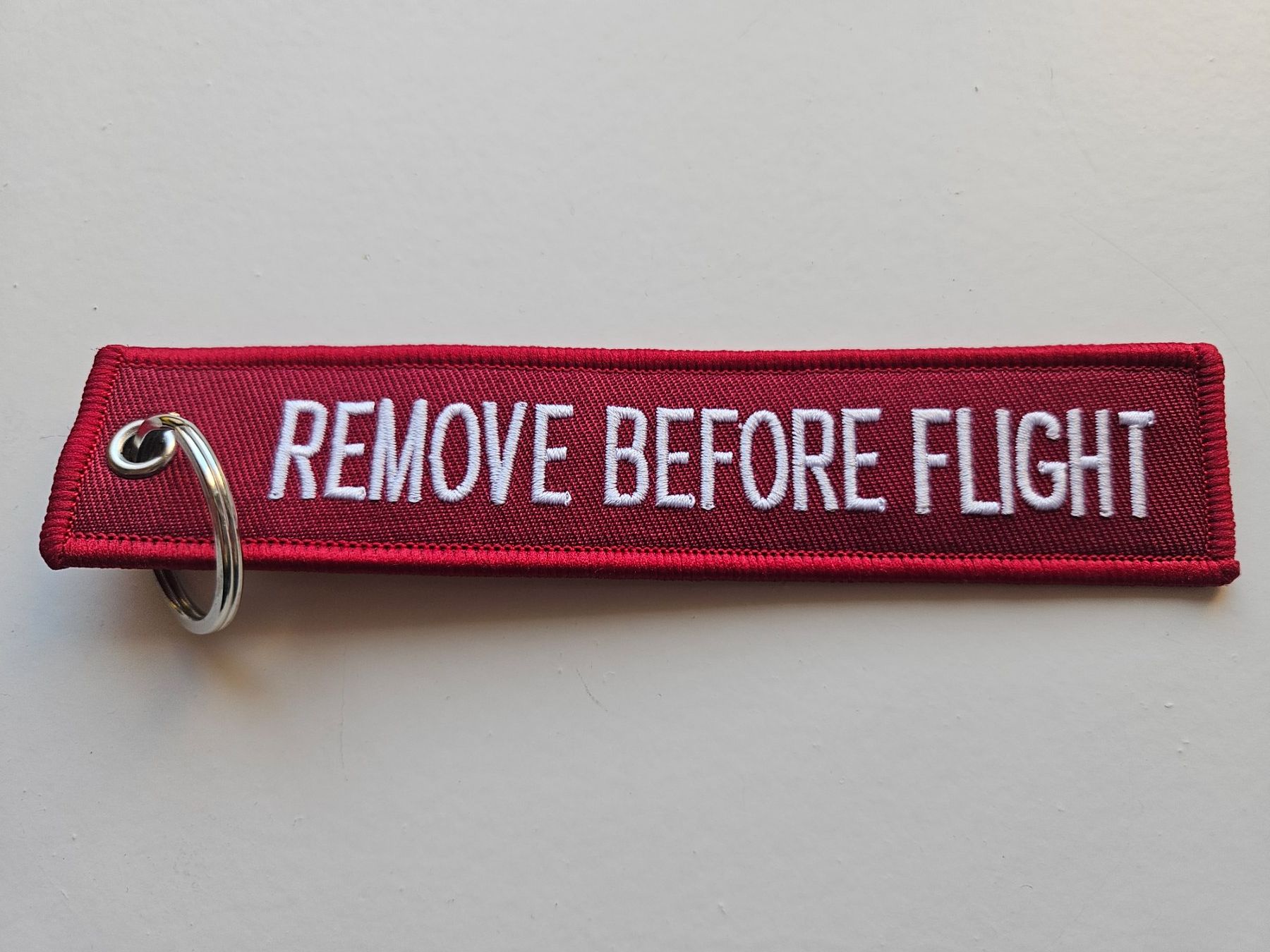 Swissair Schlüsselanhänger & - bänder: Porte-clés SWISS Remove Before Flight – Neu (gemäss Beschreibung) aus Lutry von Buby