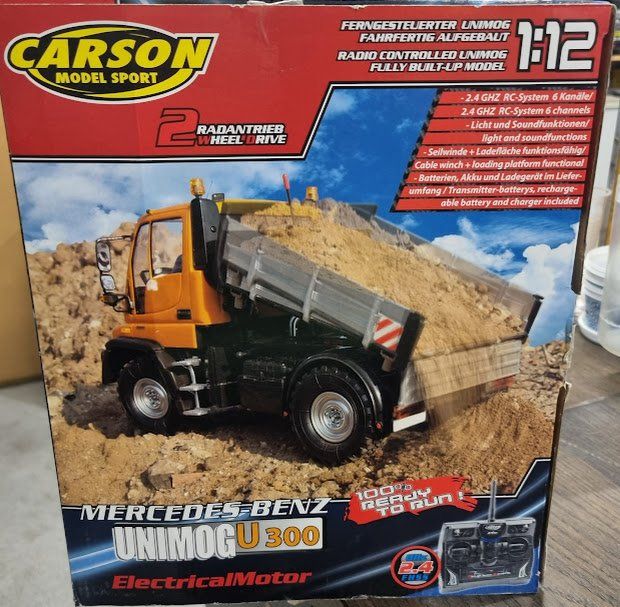 Unimog Modellini d'auto: Unimog U300 mit Seilwinde M: 1:12 Model – Nuovo e nell'imballaggio originale da Meggen venduto da baerli1976 1