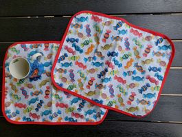 Kinder Tischset mit Bonbon-Motiv abwaschbar 2Stk.
