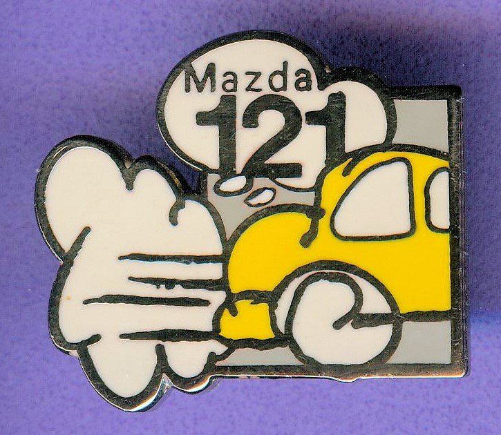 Placchette & Badge: MAZDA   121  gelb – Usato da Winterthur venduto da Sammleroase