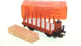 Kleinbahn H0 328: Rungenwagen mit Bremserhaus + Holzladung