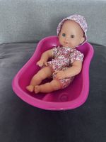 Poupée Corolle avec baignoire et vêtements