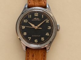 Montre Mido Multifort Extra-Flat cadran noir boîte acier