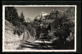 AK Arosa, Dorfstrasse mit Kirche, 1937