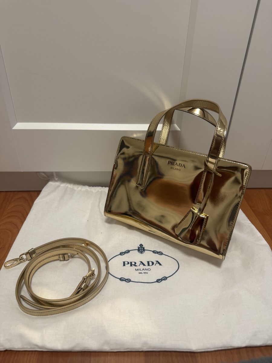 Prada Taschen für Damen: Prada Handtasche Metallic Gold – Gebraucht aus Lohn-Ammannsegg von aemu12