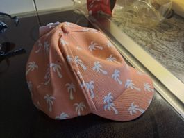Süsse Sommermütze apricot mit Palmen, Grösse 6-12 Monate