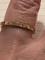 Très Joli anneau 54 serti 3 zircons solide neuf