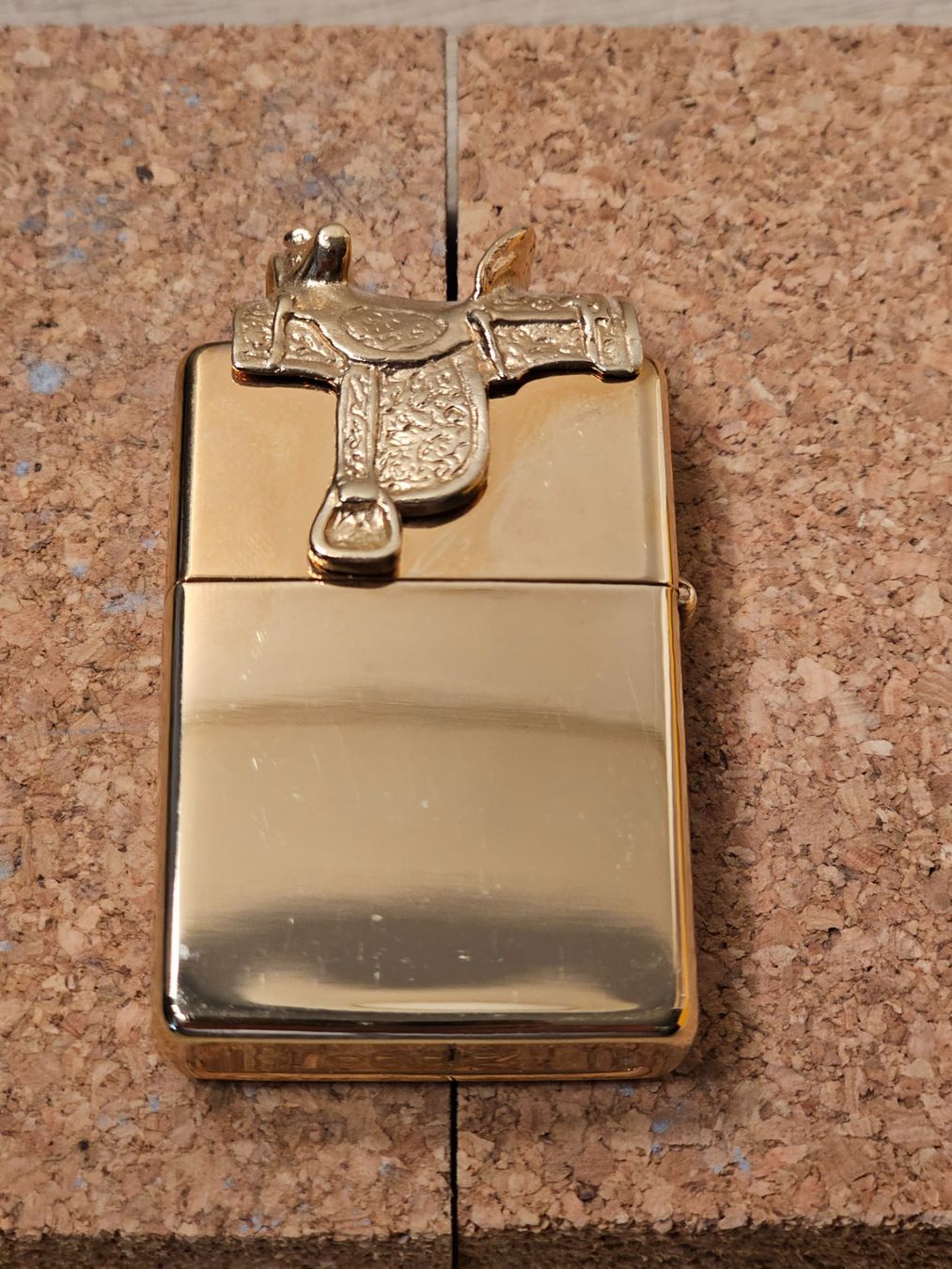 Zippo Accendini: Zippo rare, couleur Or - selle de cheval - Edition Limitée – Usato da Genève venduto da Djoff 1