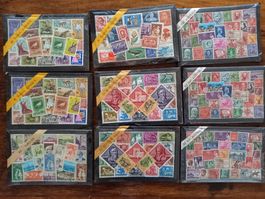 9 pochettes de timbres divers oblitérés