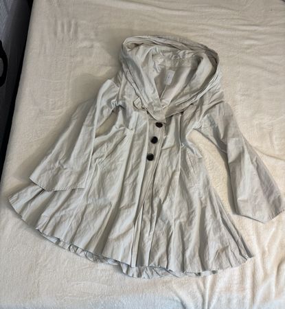 Trench coat, pretty female cut