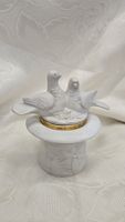 Contenitore in plastica con colombe
