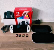 Nintendo Switch OLED + 4 jeux (dont Zelda & Hogwart)