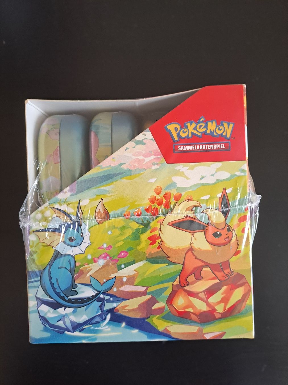 Pokémon Carte collezionabili: Prismatische Entwicklungen Mini Tin Display – Nuovo e nell'imballaggio originale da Basel venduto da mfe_86h9 1