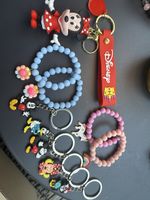 Disney Keychains 8 units small - 1 unit big and 4 Bracelets 