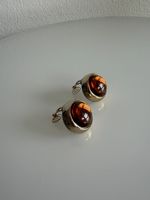 Une paire de clips vintage Yves Saint Laurent