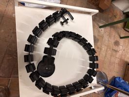 Rail de gestion de câbles type spirale/chaîne — noir