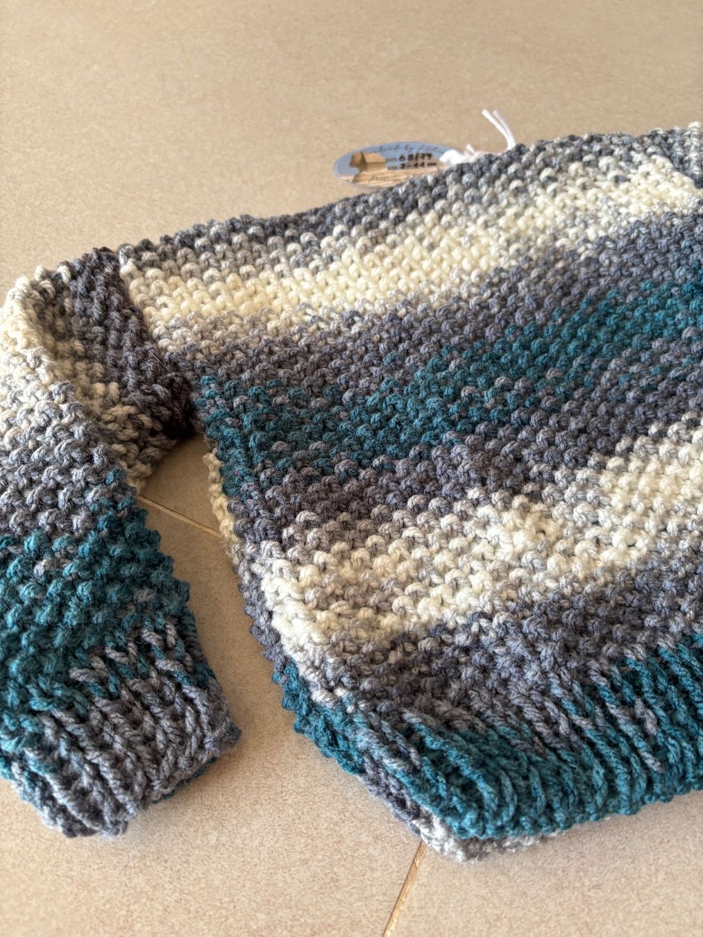 Maglioni & Felpe: Kinder Pullover gestrickt mehrfarbig Grösse 68-74 neu – Nuovo e nell'imballaggio originale da Basel venduto da Tierschutz-Flohmi 1