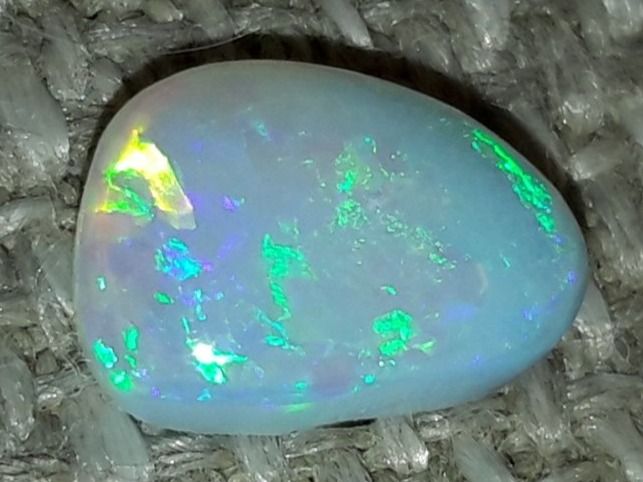 Pietre preziose: Australischer Flashfire Kristall Opal 0.9ct – Nuovo e nell'imballaggio originale da Uerkheim venduto da Winwinner 4