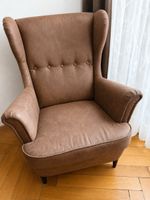 IKEA STRANDMON armchair + matching hocker in JÄRSTAD brown
