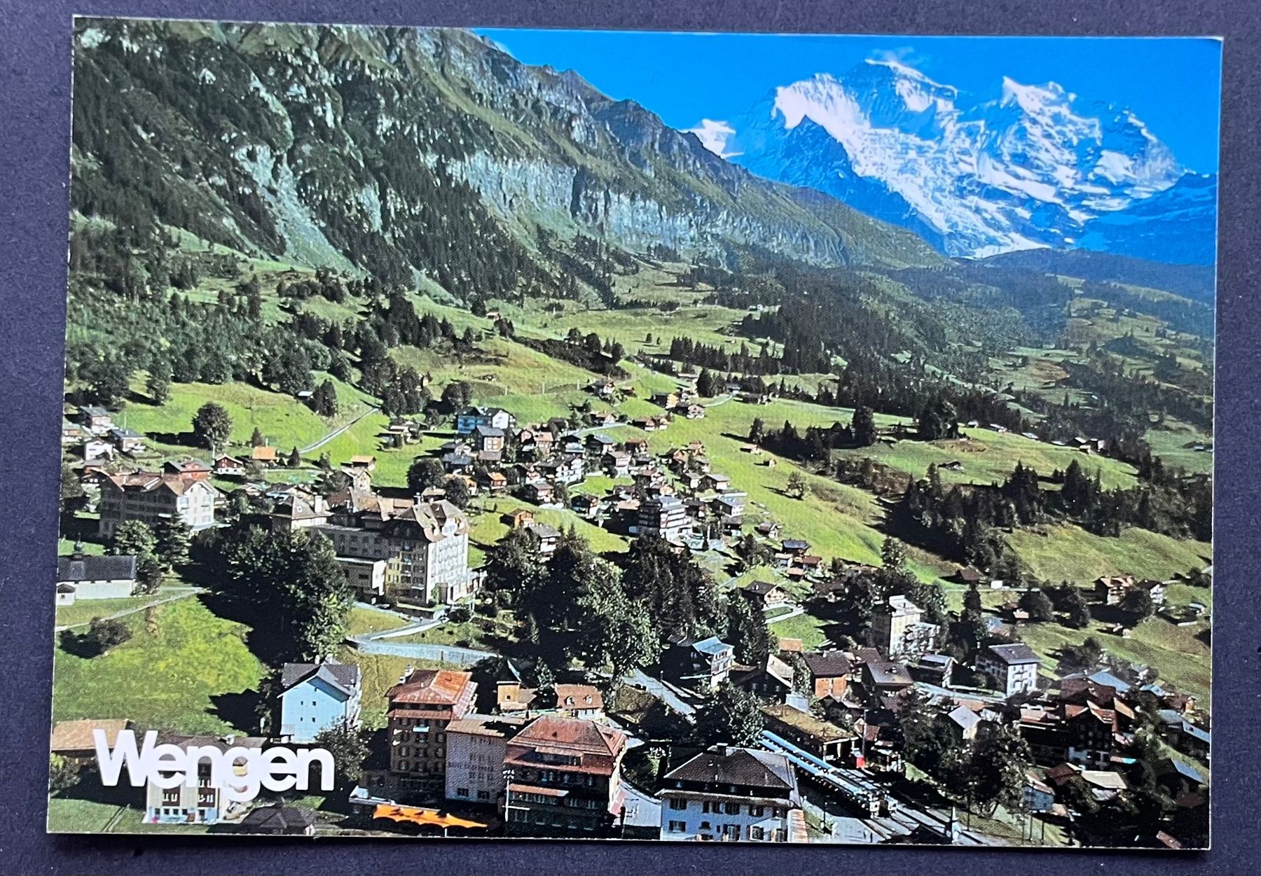 Cartoline postali: Wengen Ansicht mit Wengernalpbahn., ca. 1970 – Usato da Ostermundigen venduto da DaxKarten-75