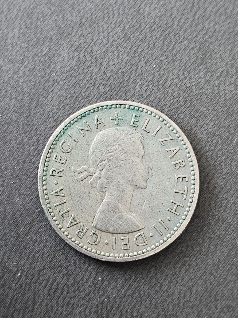Tutti le monete: 1 shilling 1962 – Usato da Nidau venduto da Misterpix 1