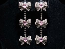 Boucles d'oreilles nœud rose cristal