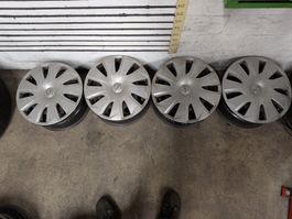4 Opel Stahlfelgen 6Jx15 ET37 mit Radkappen gebraucht
