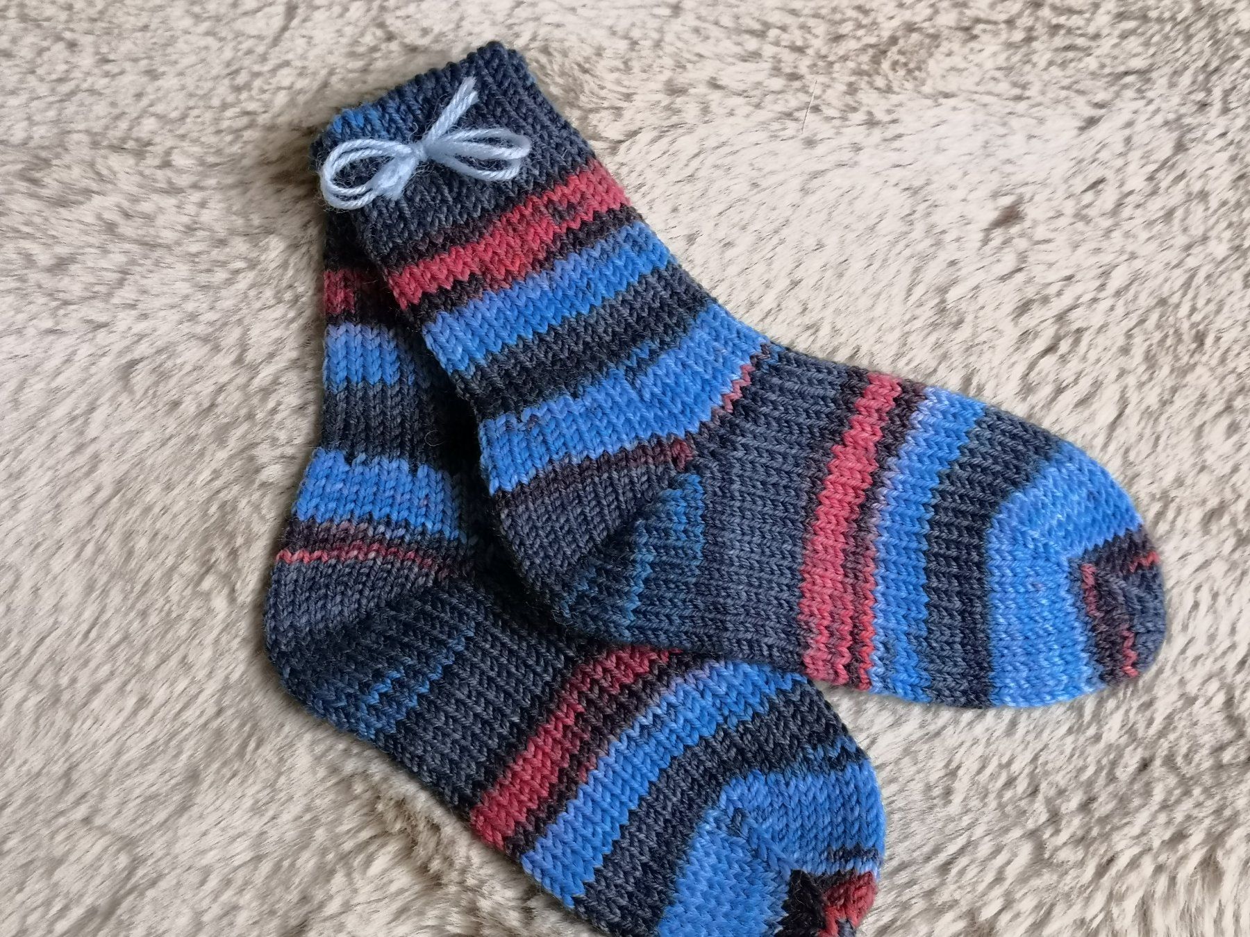 Socken für Kinder: Süsse Baby-Wollsocken – Neu und originalverpackt aus Birsfelden von Pluesser