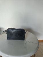 Black faux crocodile leather bag with golden details