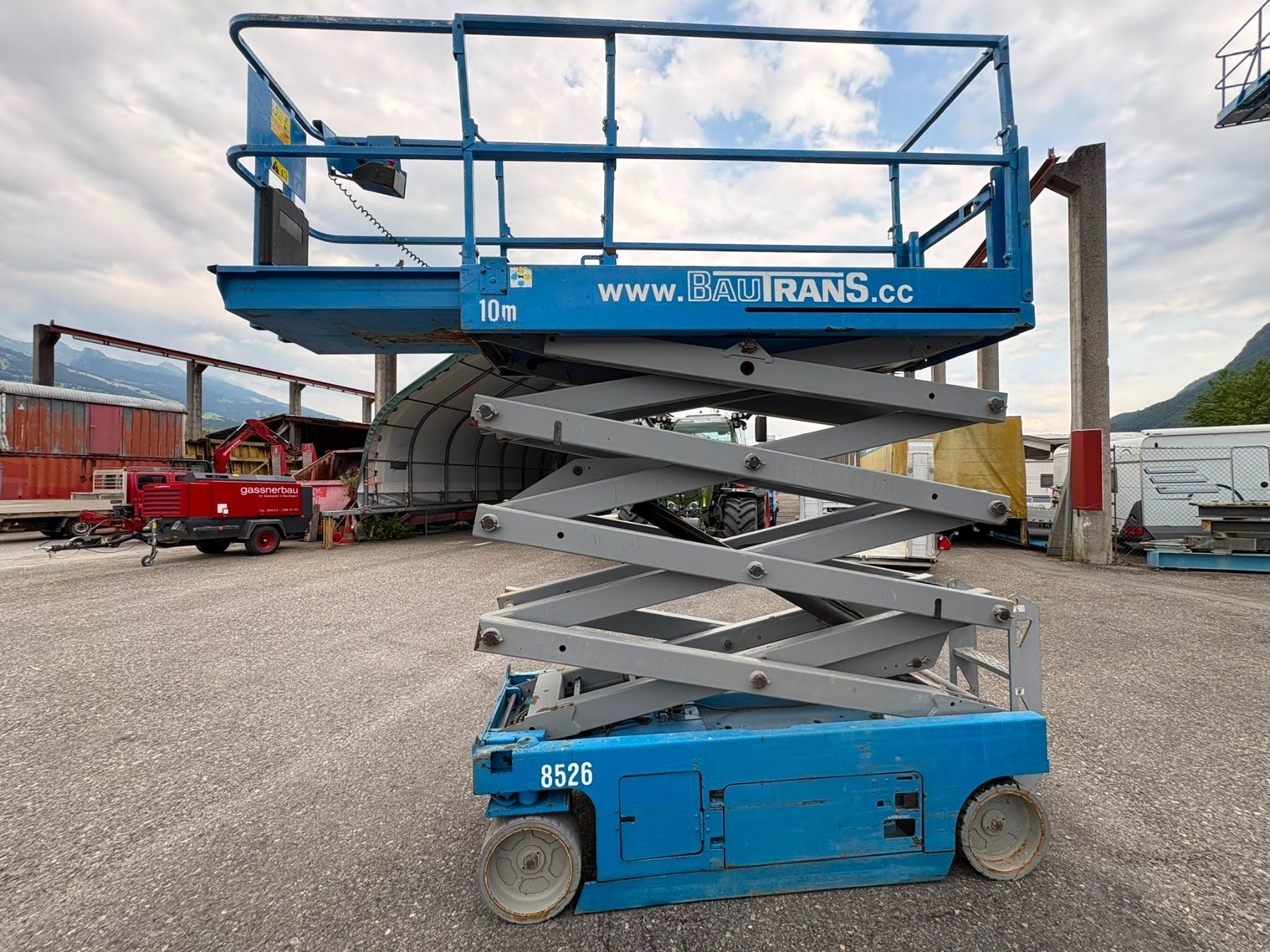 Piattaforme elevatrici & Crick: Scherenbühne Genie GS2632 AH 10m – Usato da Vaduz venduto da TRANS-AGRAR 1
