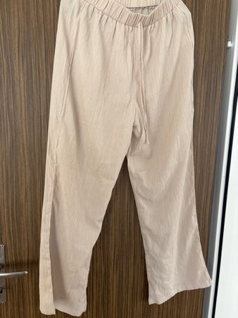 Stoffhose Damen beige weit geschnitten Grösse L neuwertig