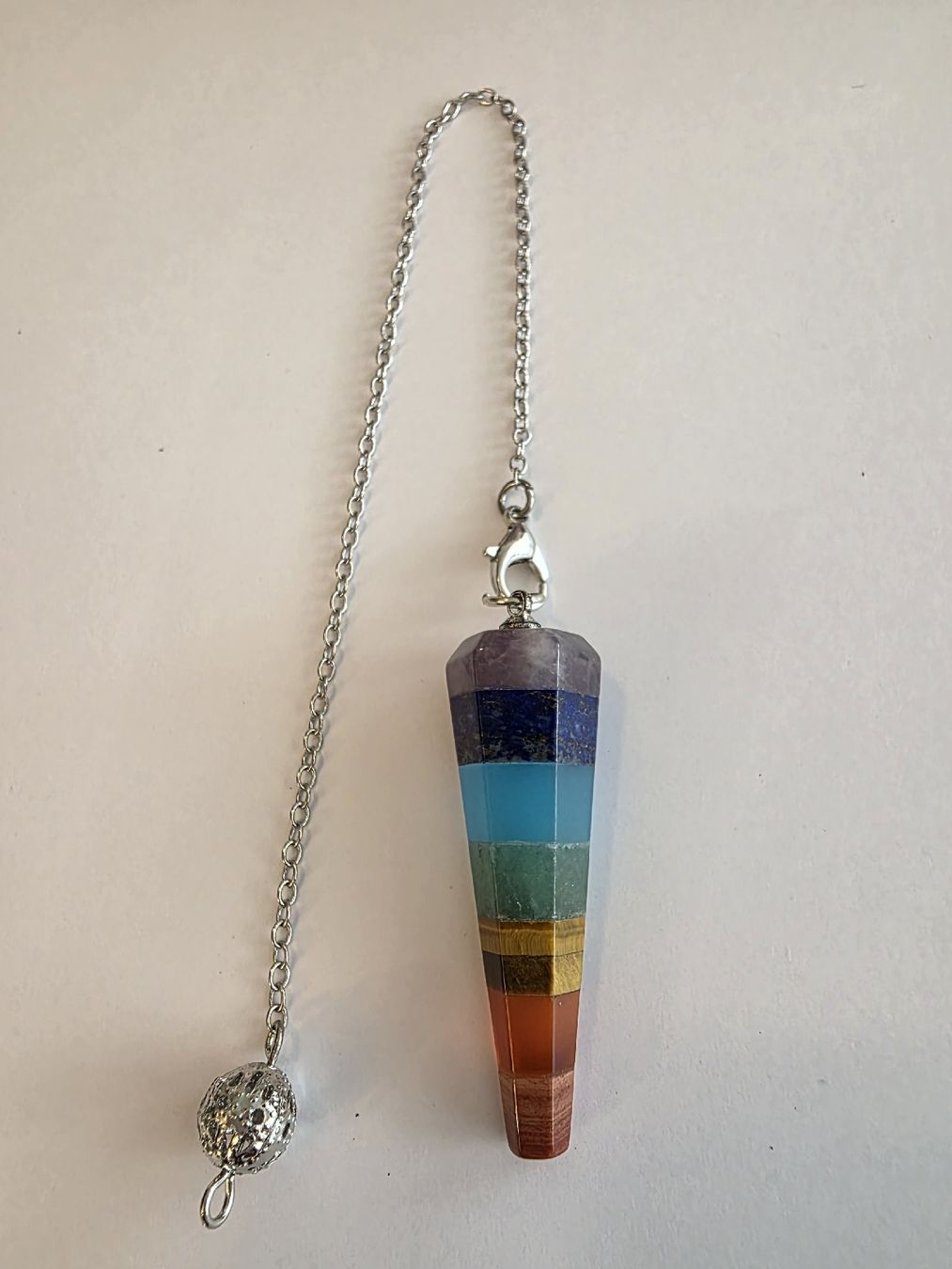 Minerali & Pietre curative: Chakra Stein Pendel 4cm.x1,5cm. – Nuovo e nell'imballaggio originale da Menziken venduto da Mirager 1