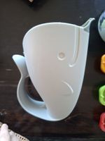 Becher um Babys und Kinder Haare zu waschen