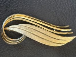 Broche vintage signe Amerik  dorée - Élégance intemporelle