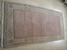 Orientteppich beige rosa mit Fransen gebrauchter Zustand