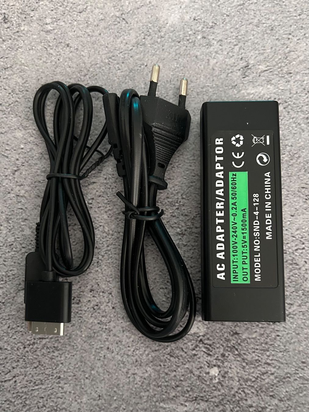 Sony Adattatori & Cavi: PlayStation PSP Go Ladekabel / AC Adapter Netzteil – Nuovo (secondo la descrizione) da Niederwil SO venduto da BlueSonic